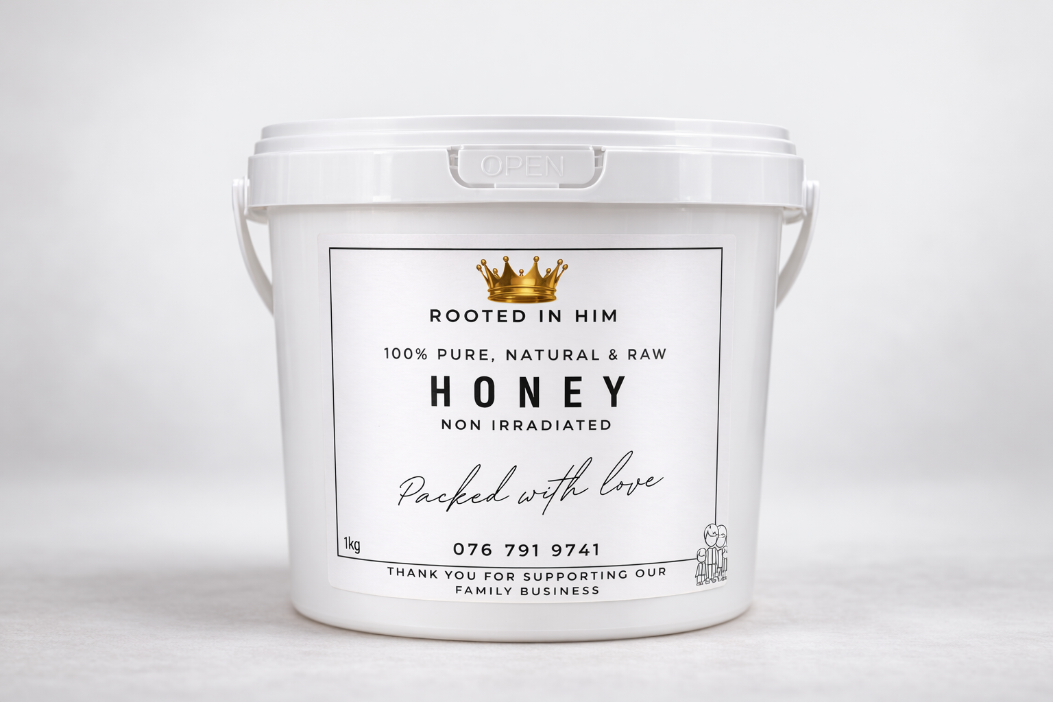 1kg container of pure raw honey with Rooted in Him label